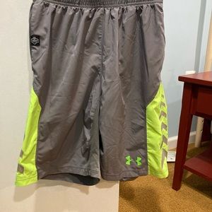 Men’s Under Armour size small grey with fluorescent green stretch sport shorts